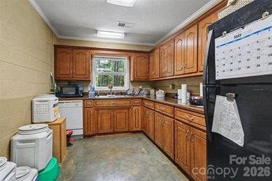 Stunning custom home on 5 private acres with a picturesque pond - photo 31