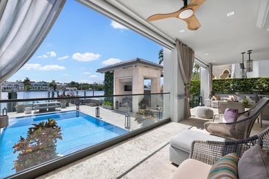 Welcome to luxury waterfront living at 176 S Hibiscus Drive in - photo 31