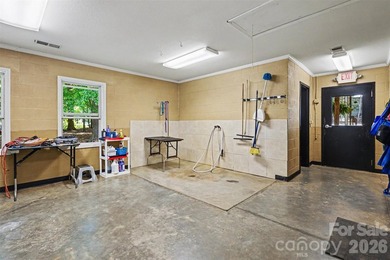 Stunning custom home on 5 private acres with a picturesque pond - photo 32