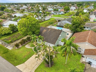 Welcome to this charming single-story residence in North Palm - photo 32