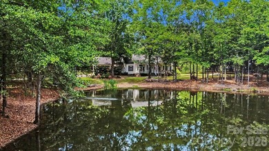 Stunning custom home on 5 private acres with a picturesque pond - photo 37