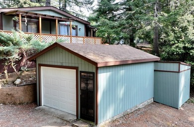 Tucked into a peaceful, wooded setting, this restored 2-bedroom - photo 3