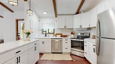 Tucked into a peaceful, wooded setting, this restored 2-bedroom - photo 9
