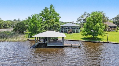 Beautiful Deep Waterfront home with a large pier and covered - photo 1