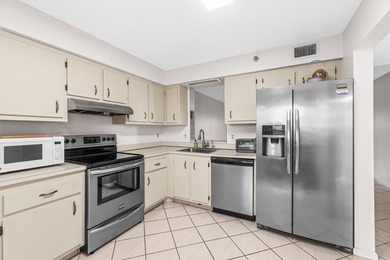 This impeccably maintained 2-bedroom, 2-bath condo with gorgeous - photo 4