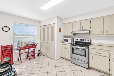 This impeccably maintained 2-bedroom, 2-bath condo with gorgeous - photo 5