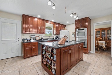 Beautiful Deep Waterfront home with a large pier and covered - photo 10