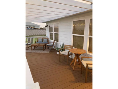 Step into island-style living with this charming - photo 11