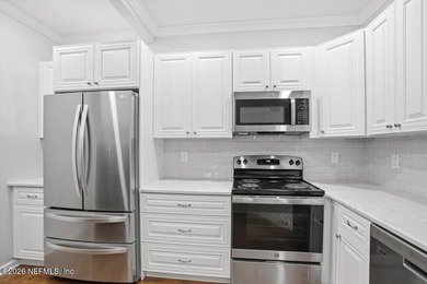 Welcome Home... to this Immaculate Fully Renovated condo on the - photo 10