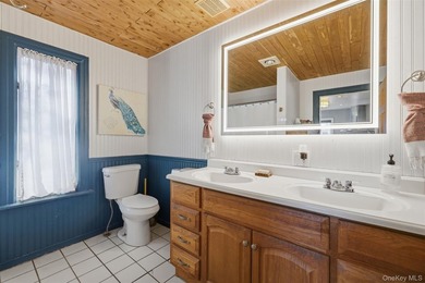 Charming 3-bedroom, 1.5-bath home in Mahopac with lake access to - photo 11