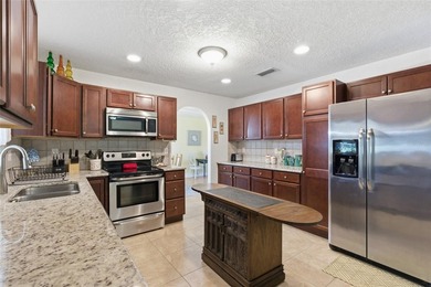 The moment you step through the front door, this turnkey home - photo 14