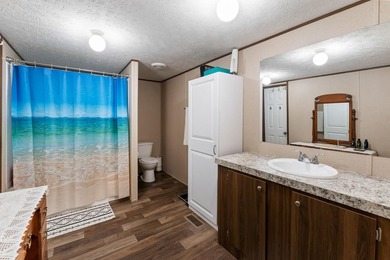 Charming 3-bedroom, 2-bath home located in the highly desirable - photo 16