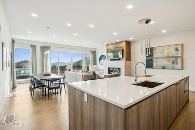 Enjoy this premiere location in Canyons Village with true ski-in - photo 12
