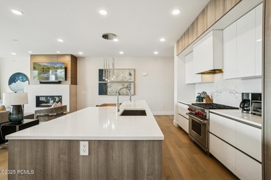 Enjoy this premiere location in Canyons Village with true ski-in - photo 14