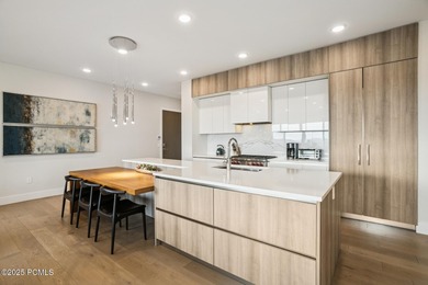 Enjoy this premiere location in Canyons Village with true ski-in - photo 15