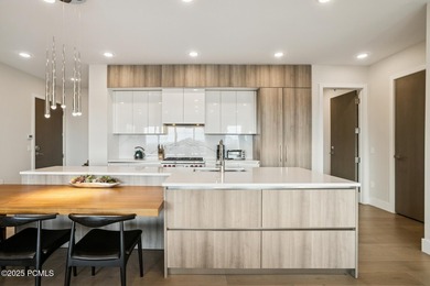 Enjoy this premiere location in Canyons Village with true ski-in - photo 16