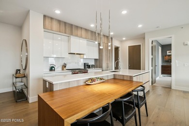 Enjoy this premiere location in Canyons Village with true ski-in - photo 18