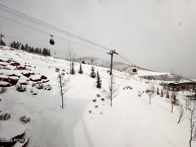 Enjoy this premiere location in Canyons Village with true ski-in - photo 27