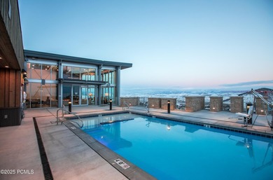 Enjoy this premiere location in Canyons Village with true ski-in - photo 59