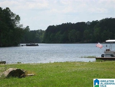 Enjoy this very quiet, peaceful, gated Lay Lake community with - photo 4
