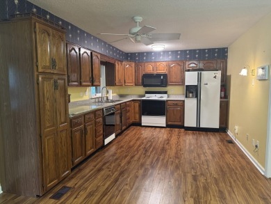 Beautiful brick home with four bedrooms, living room