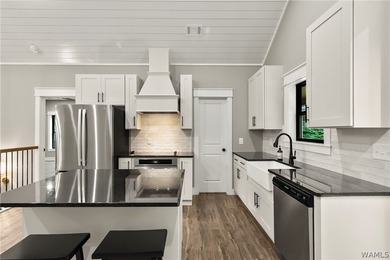 Experience lakefront luxury in this stunning new construction on - photo 12