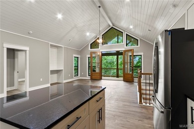 Experience lakefront luxury in this stunning new construction on - photo 18