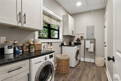 Experience lakefront luxury in this stunning new construction on - photo 19