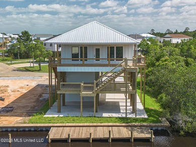 Welcome to this stunning new construction waterfront home! This - photo 1