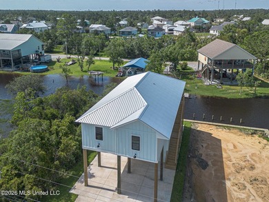 Welcome to this stunning new construction waterfront home! This - photo 2