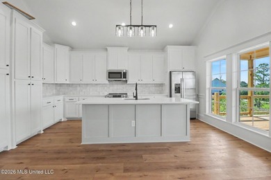 Welcome to this stunning new construction waterfront home! This - photo 6