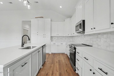 Welcome to this stunning new construction waterfront home! This - photo 7