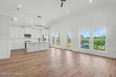 Welcome to this stunning new construction waterfront home! This - photo 8