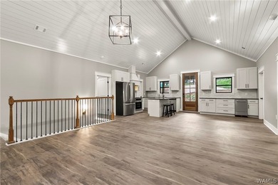 Experience lakefront luxury in this stunning new construction on - photo 31