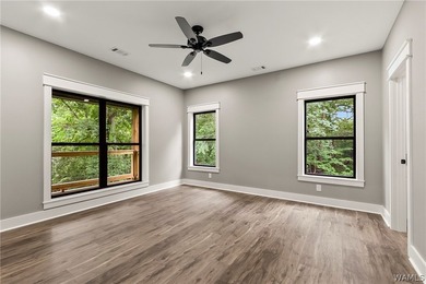 Experience lakefront luxury in this stunning new construction on - photo 33