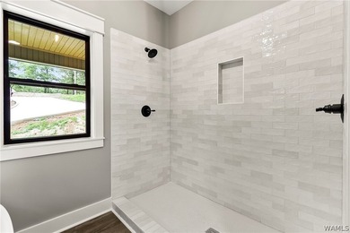 Experience lakefront luxury in this stunning new construction on - photo 36