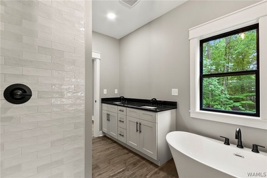 Experience lakefront luxury in this stunning new construction on - photo 37