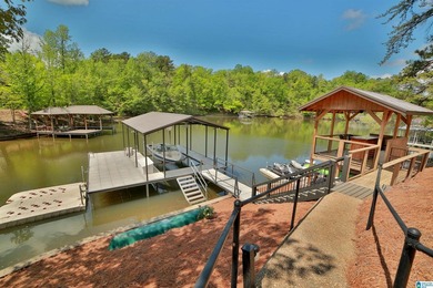 This custom LAKEFRONT CRAFTSMAN home has a NEW ROOF and is - photo 1