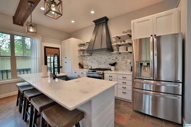 This custom LAKEFRONT CRAFTSMAN home has a NEW ROOF and is - photo 4