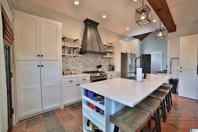 This custom LAKEFRONT CRAFTSMAN home has a NEW ROOF and is - photo 5