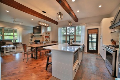 This custom LAKEFRONT CRAFTSMAN home has a NEW ROOF and is - photo 6