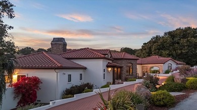 Located behind a private gate on 19.22 acres in San Benancio - photo 3