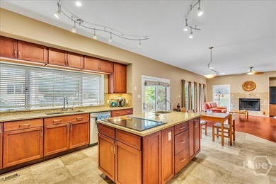 This inviting 5-bedroom, 3-bath all-brick home sits on just - photo 11
