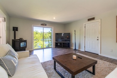 Discover year-round lakeside living with this inviting 3-bedroom - photo 11