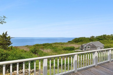 Tucked away on the shores of Fort Pond Bay, this well-kept 2,500 - photo 26