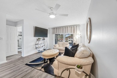 Introducing this beautifully maintained 2-bedroom condo with - photo 3