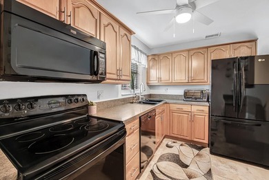 Introducing this beautifully maintained 2-bedroom condo with - photo 6