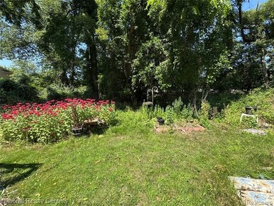 Behind the trees and overgrowth, there is a home just waiting to - photo 3