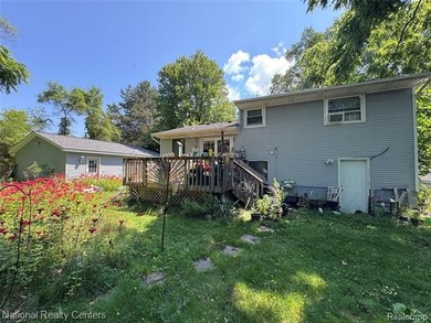 Behind the trees and overgrowth, there is a home just waiting to - photo 6