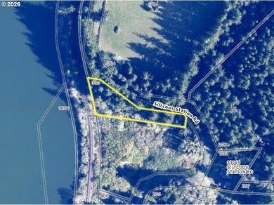 Tucked away in a peaceful, tree-filled setting, this 0.75-acre - photo 1